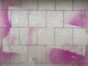 Dancing in my underpants. Picture from the photobook. Tiled foor with marks of pink paint
